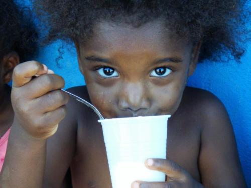 Cook makes home made yogurt for the children