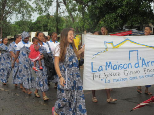 Women's Day parade with children, staff anf volunteers